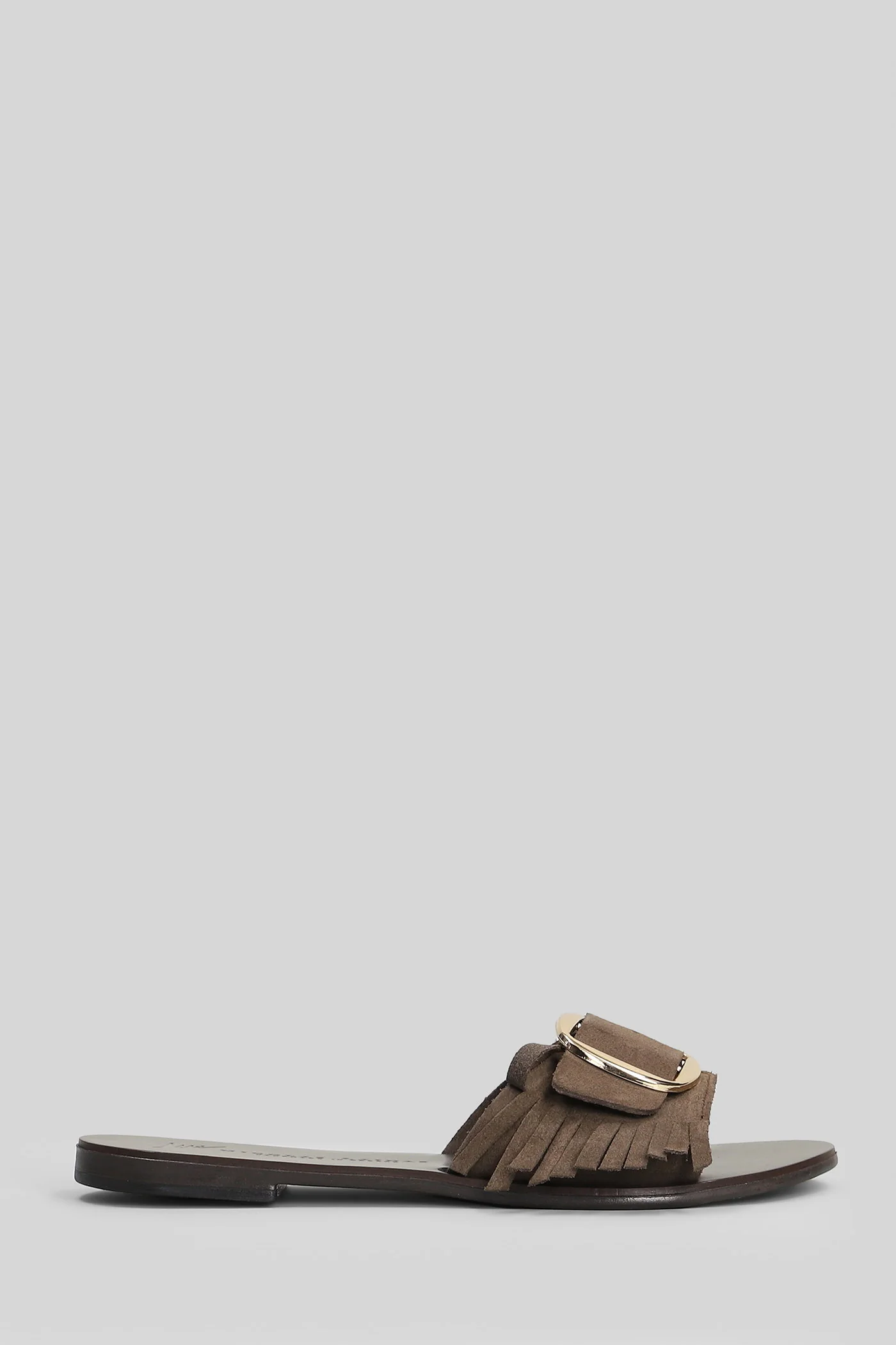 Flat sandal-slipper in brown suede