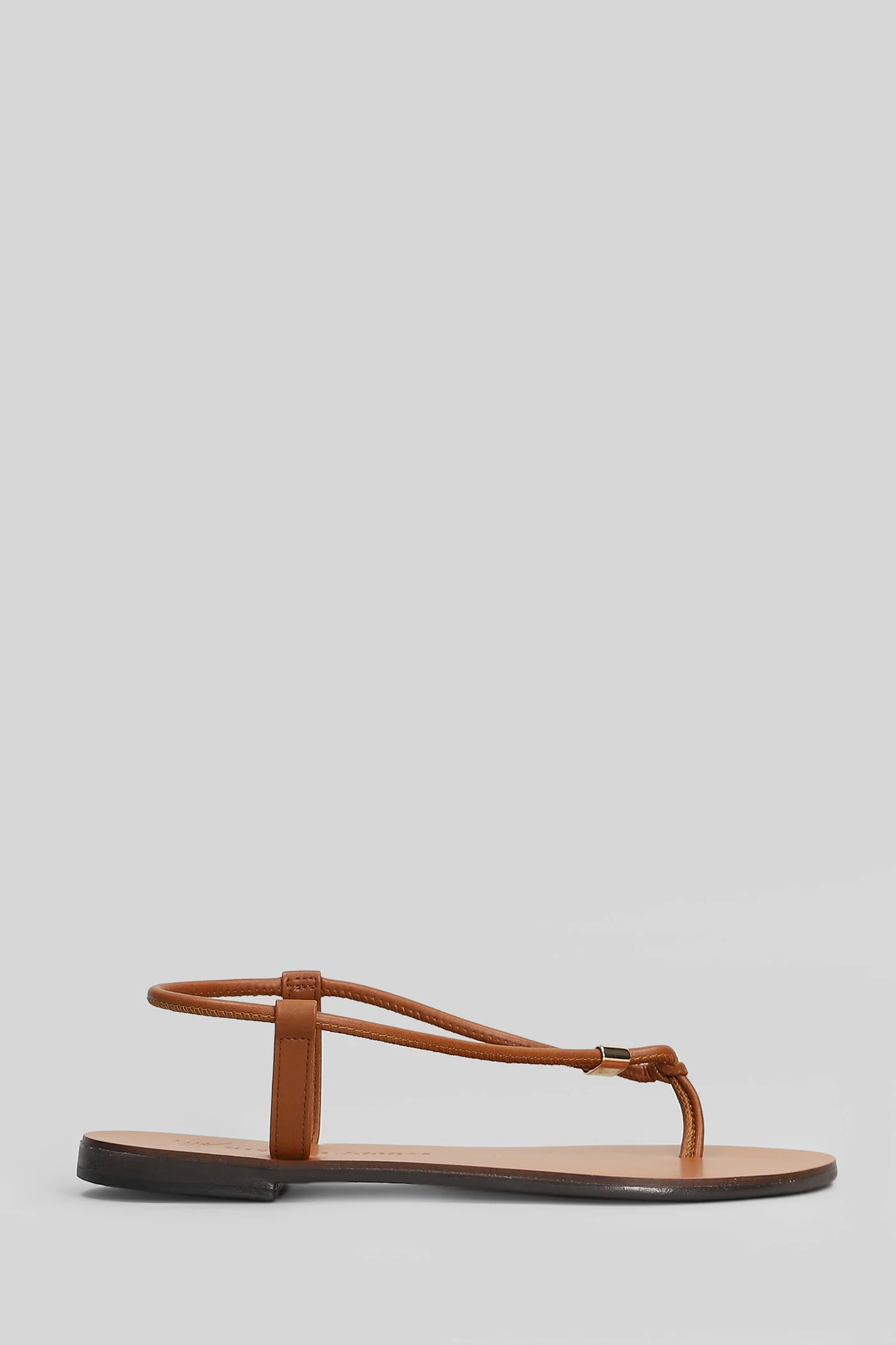 Flat sandal-slipper in leather color leather