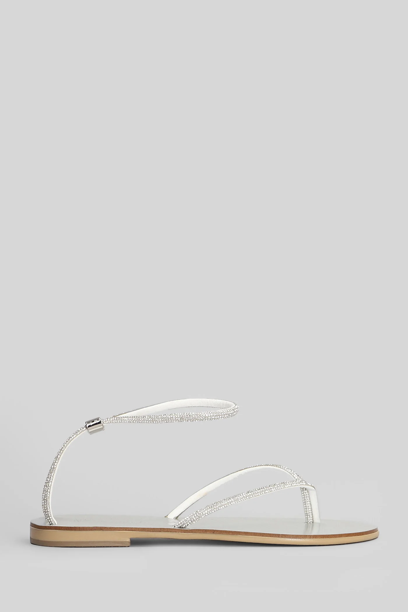 Flat sandal-slipper in silver leather