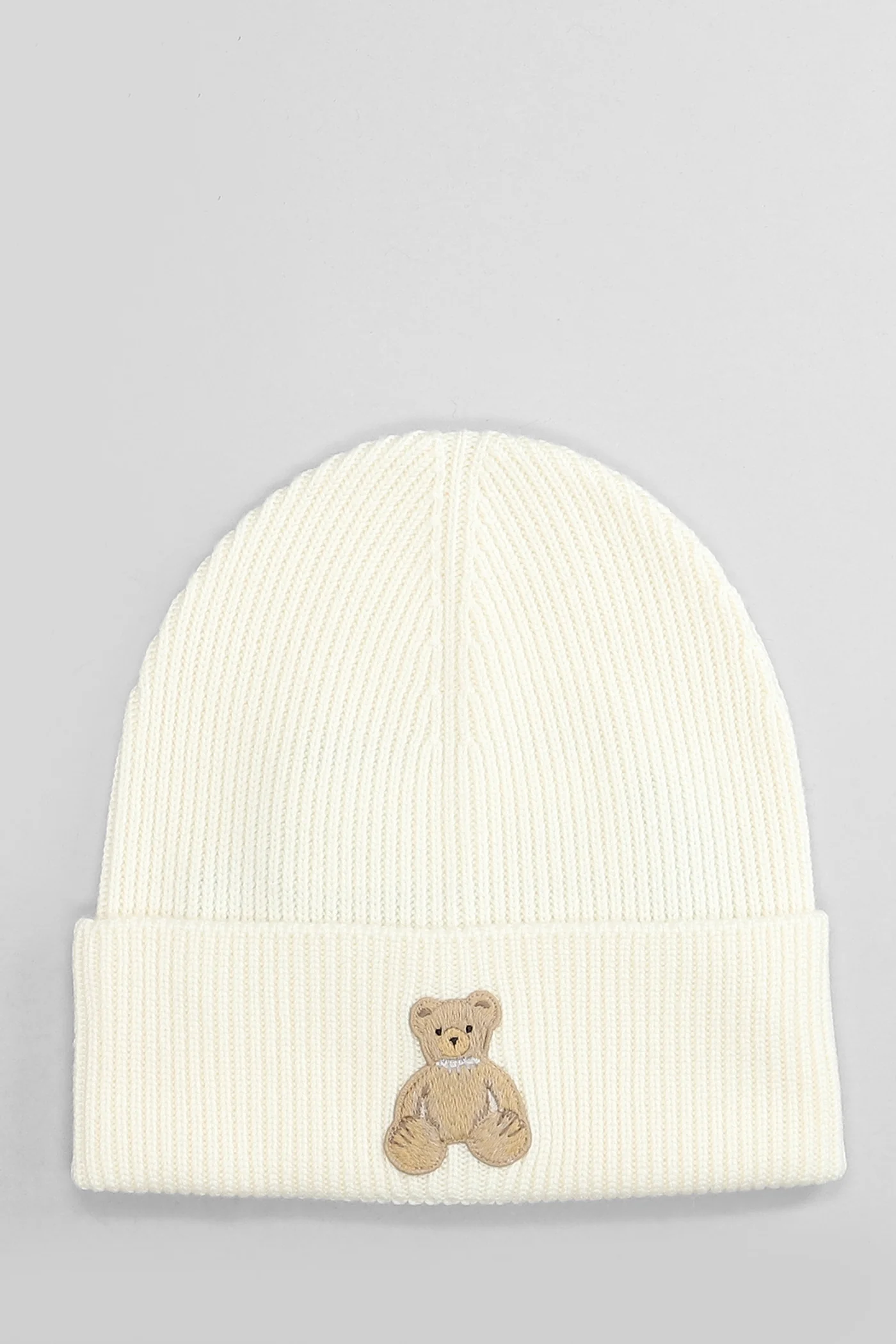 Hats in beige wool