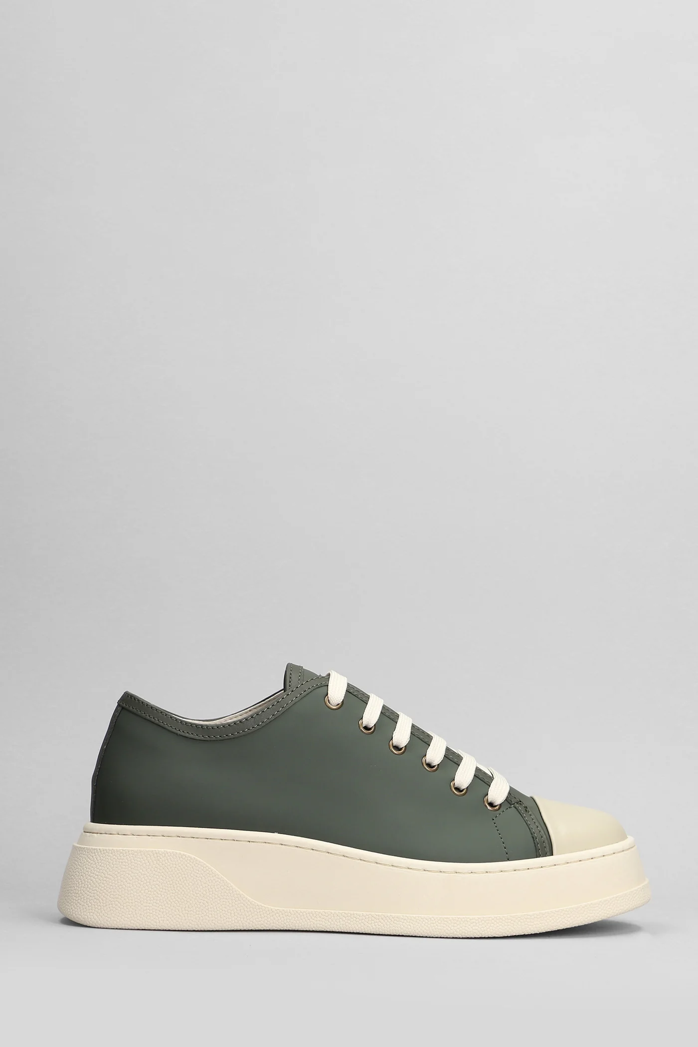 Sneakers in green rubber/plasic