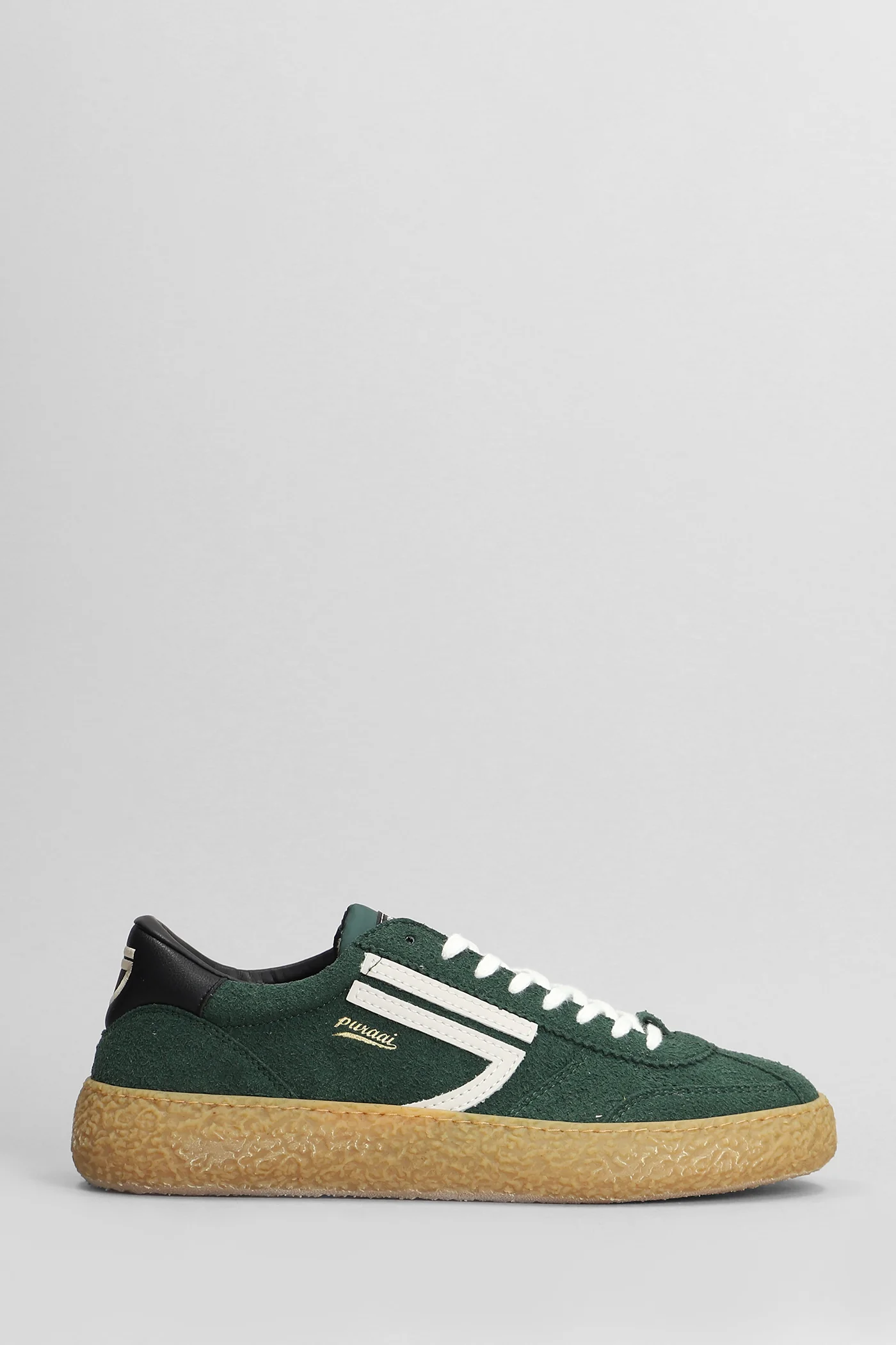 Sneakers in green suede