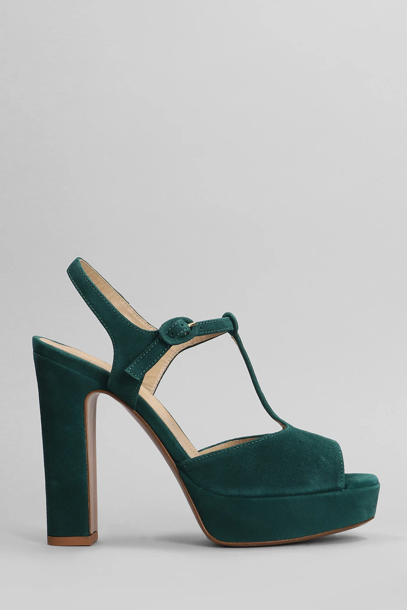 Sandals in green suede
