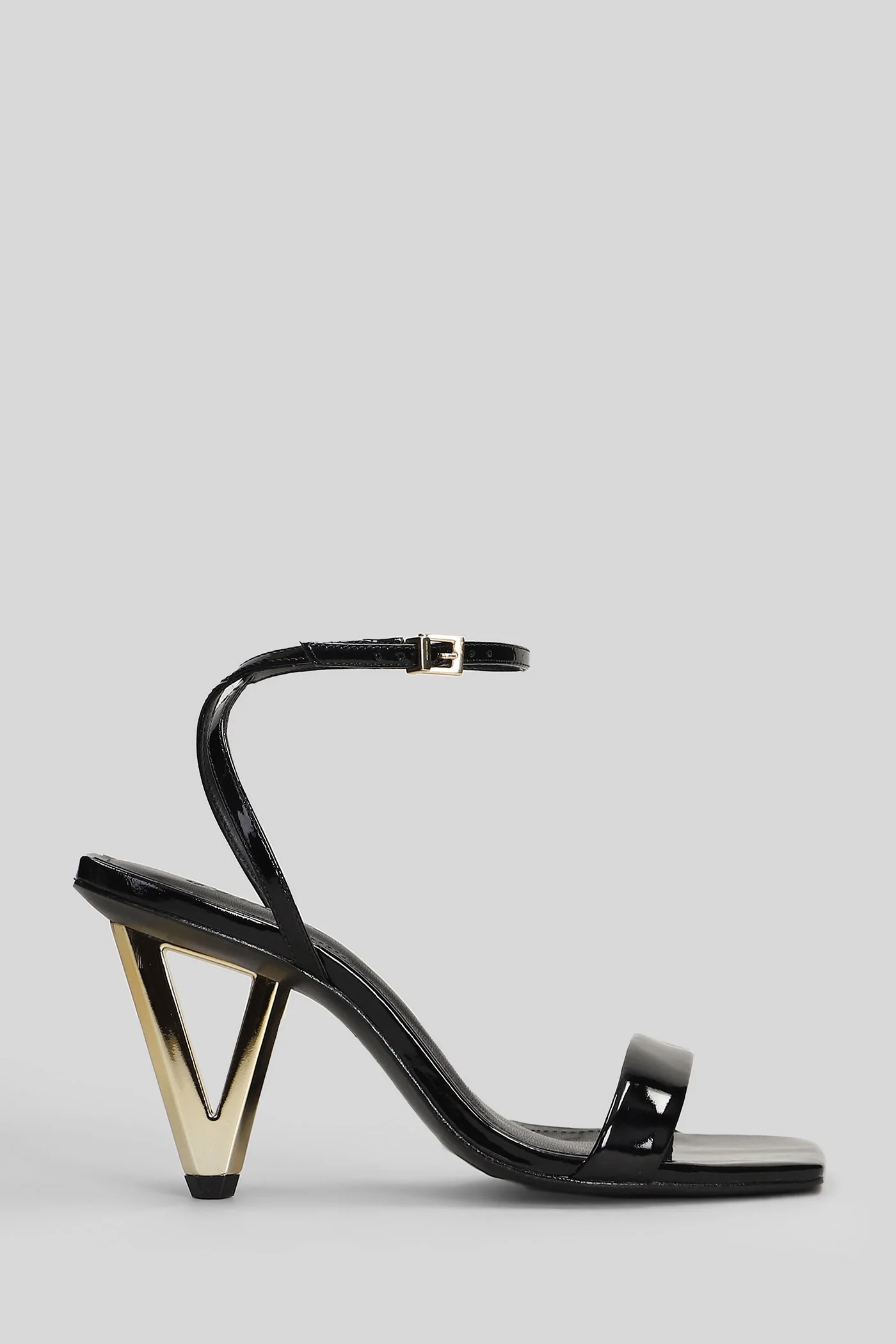 Sandals in black patent leather