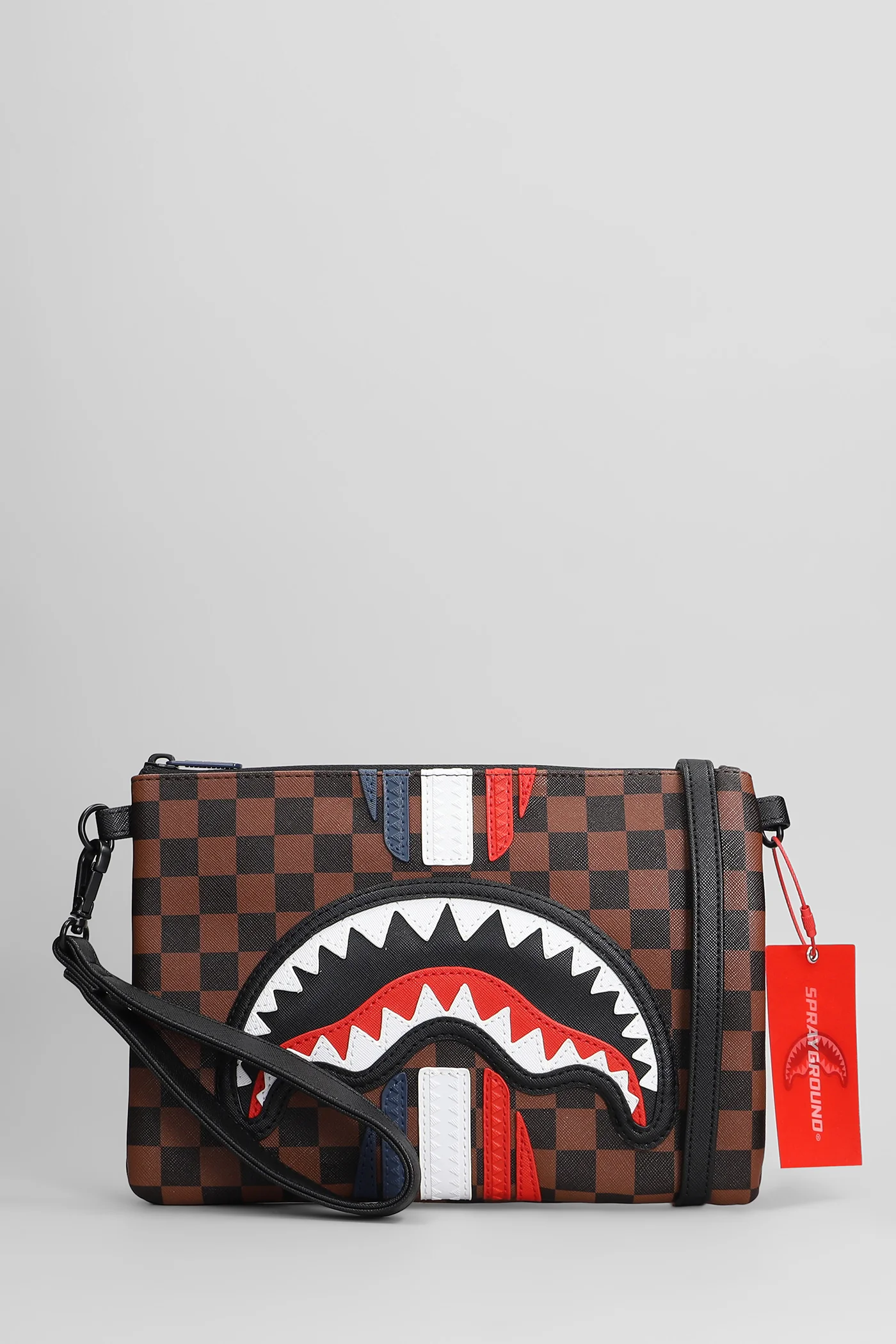 Clutch in brown PVC