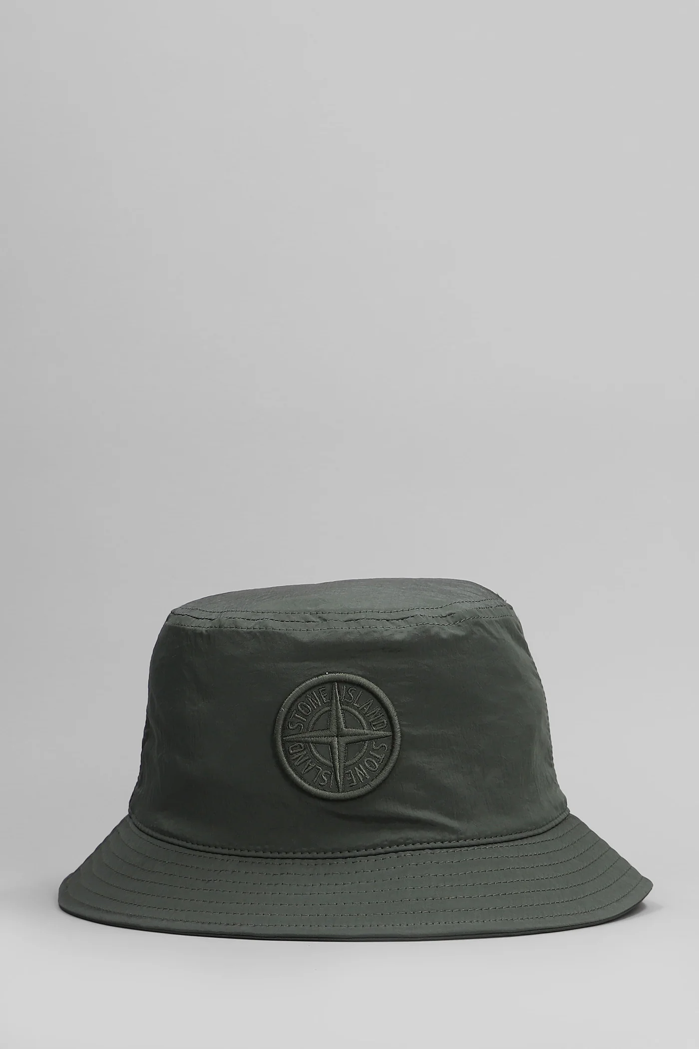 Hats in green polyamide