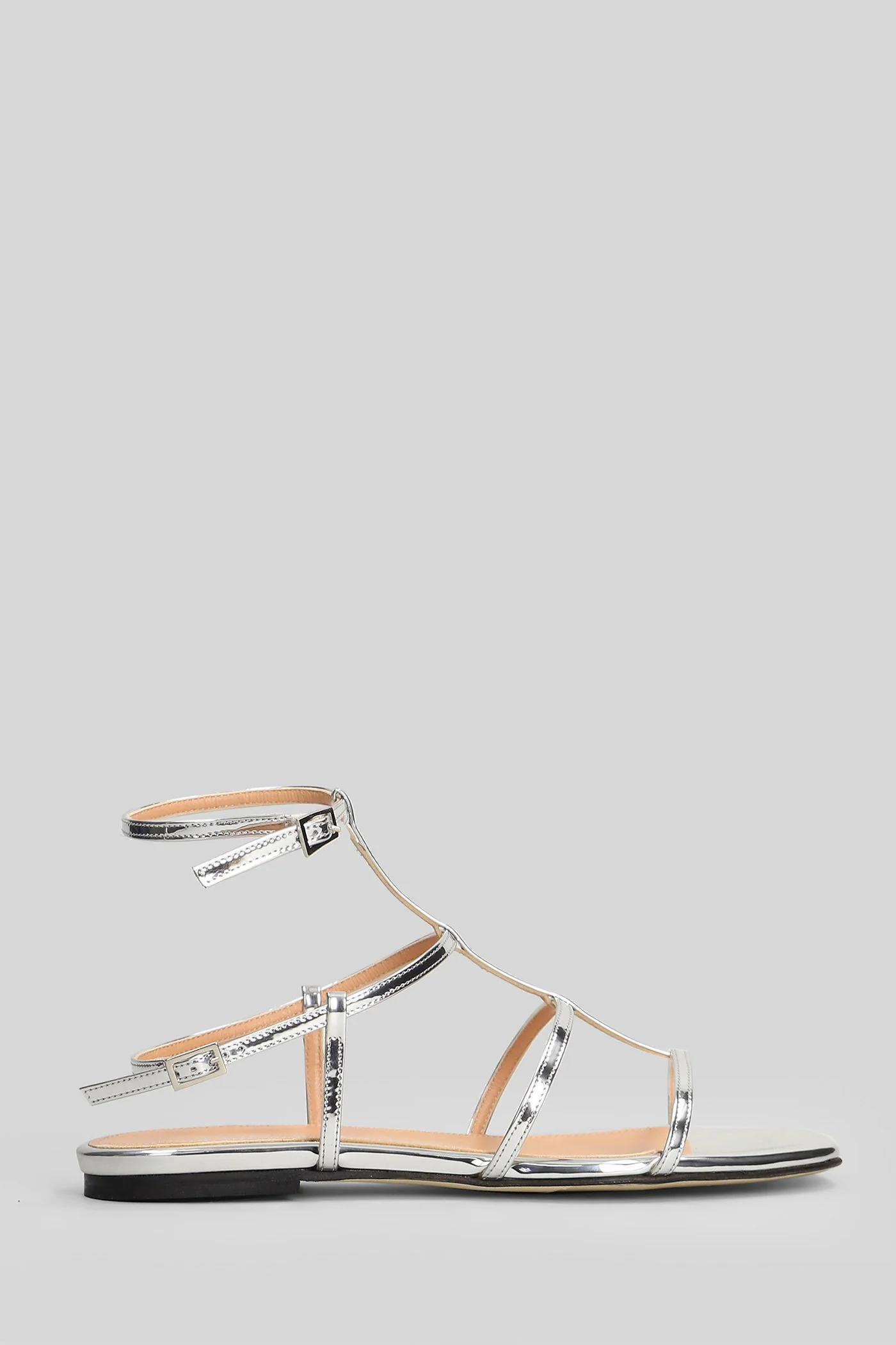 Flat sandal-slipper in silver leather