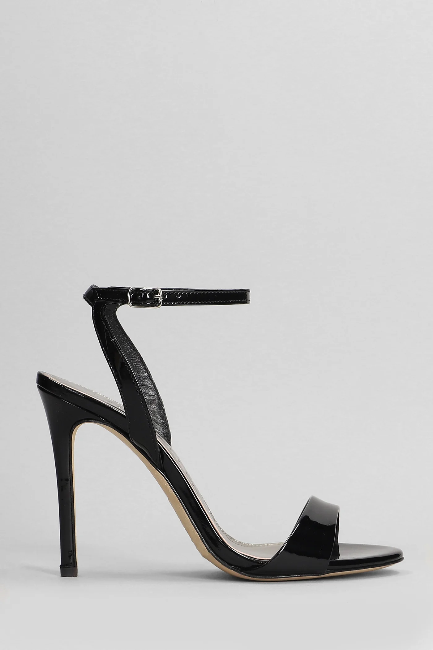 Sandals in black patent leather
