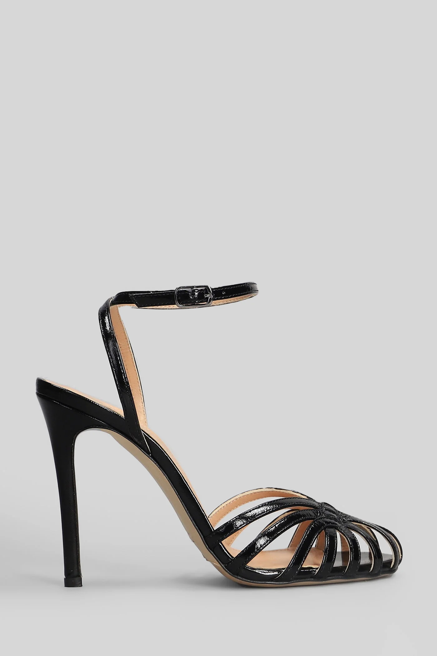 Sandals in black patent leather