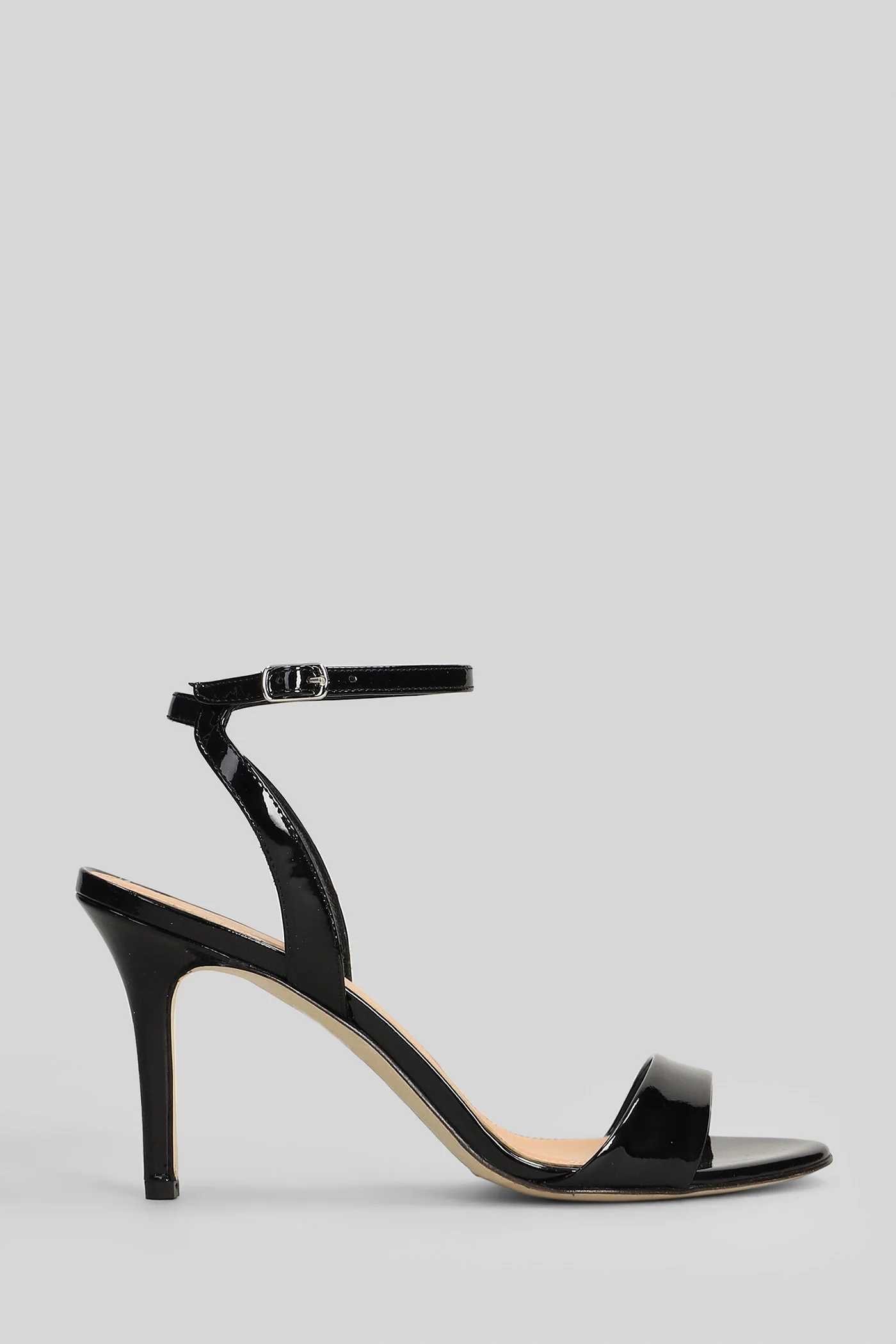 Sandals in black patent leather