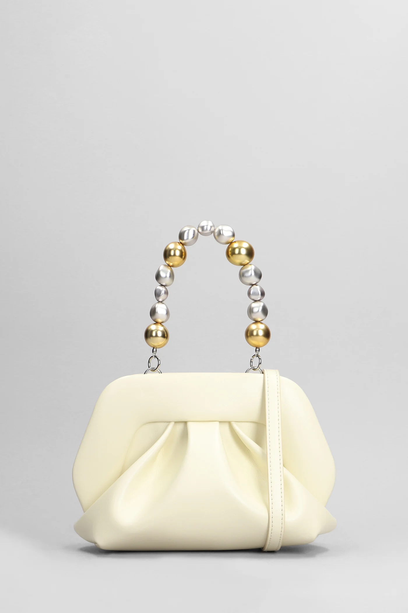 Gea Apple Beads Clutch in beige faux leather