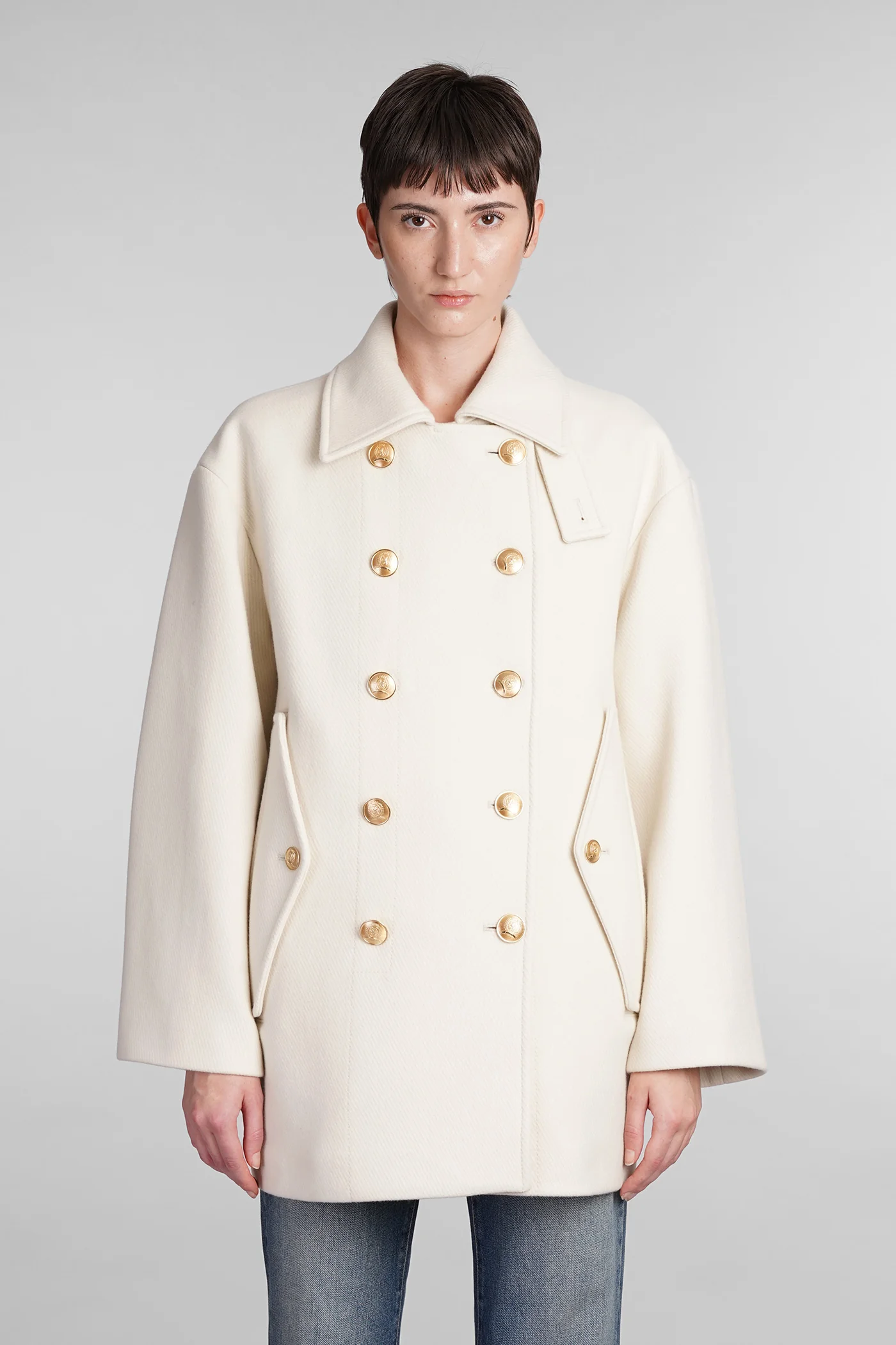 Coat in beige wool