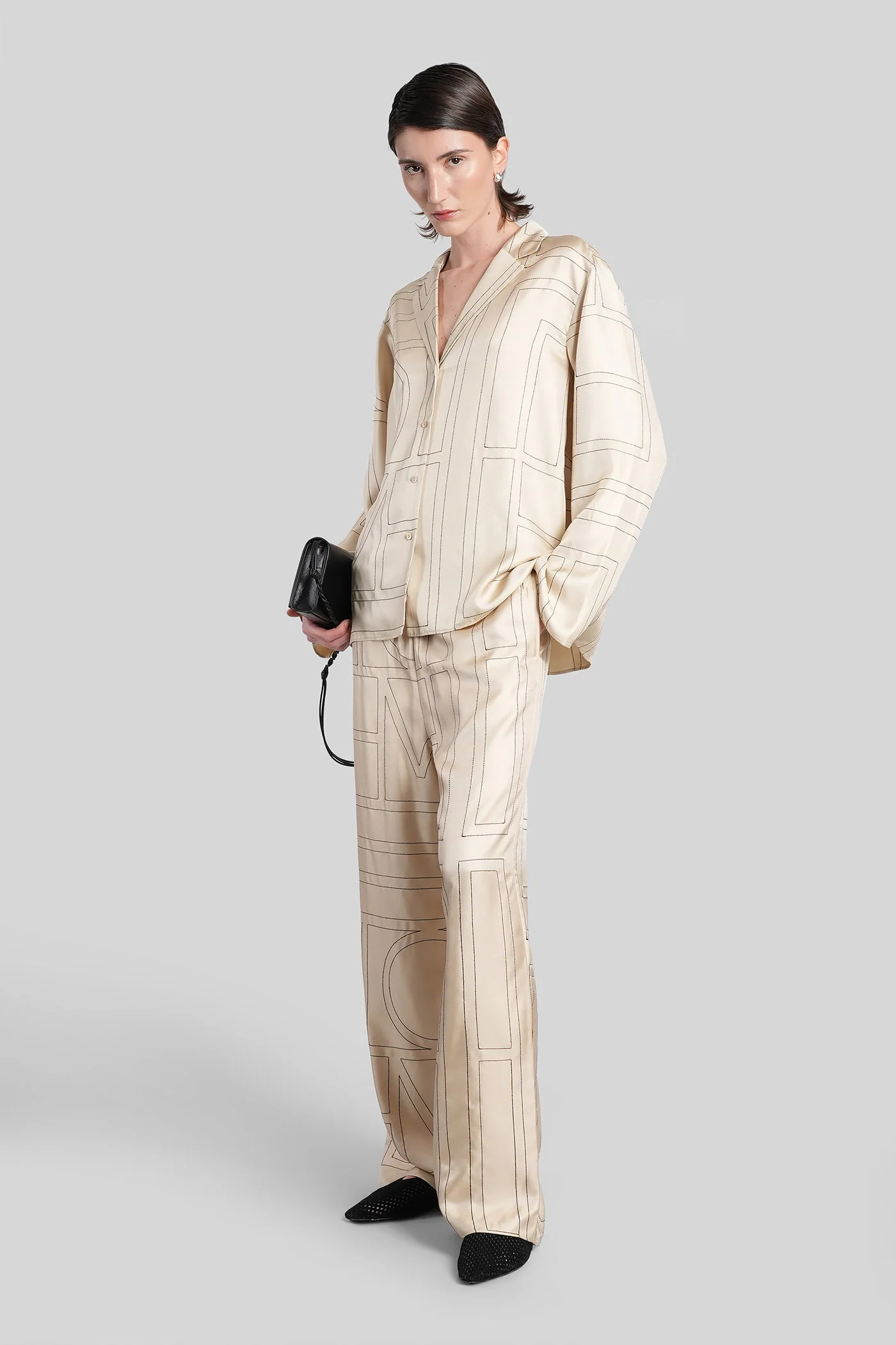 Pants in beige silk - Image 2