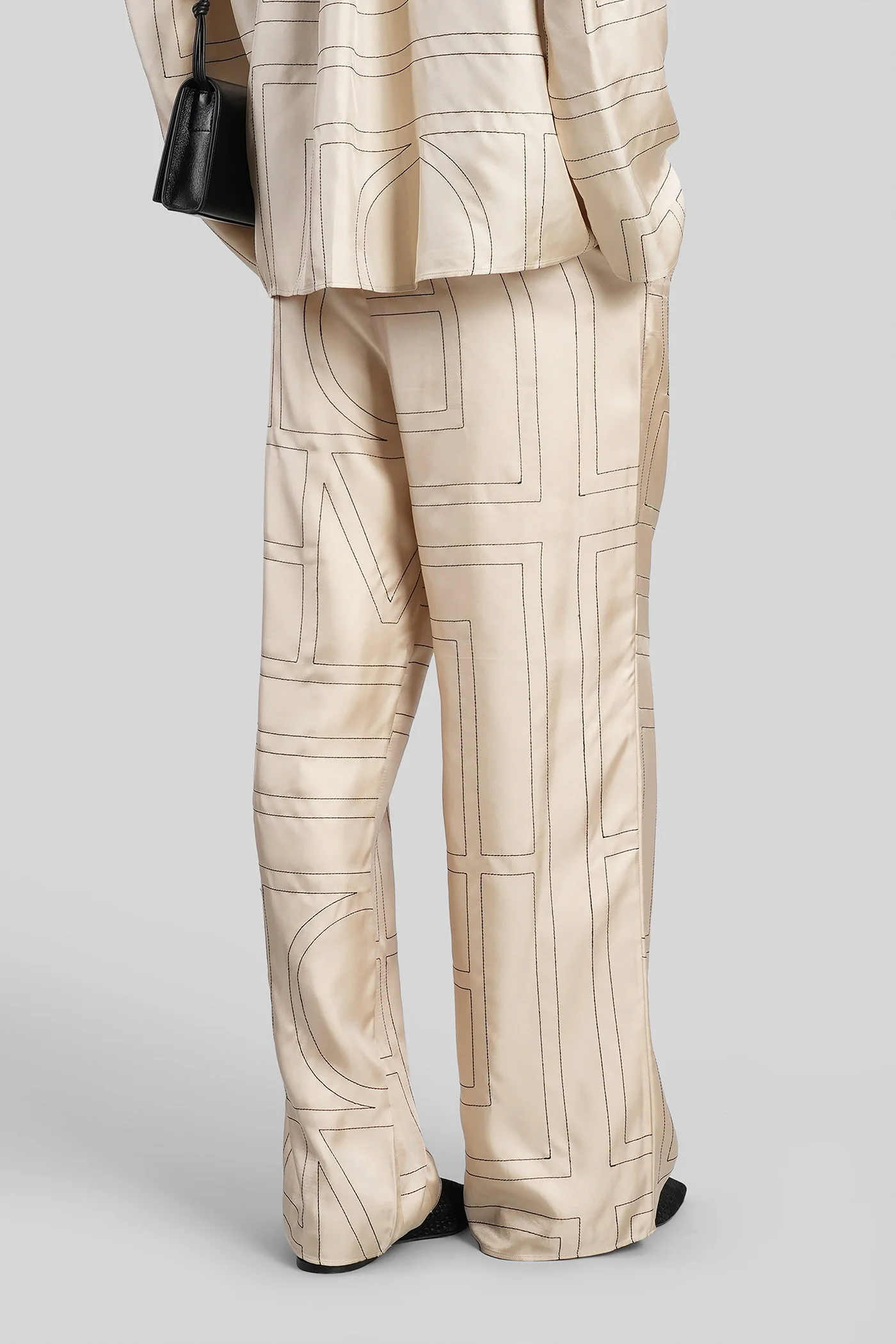 Pants in beige silk - Image 3