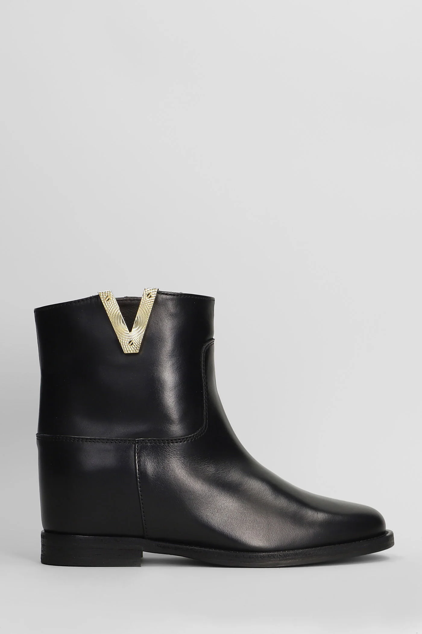Ankle boots inside wedge in black leather