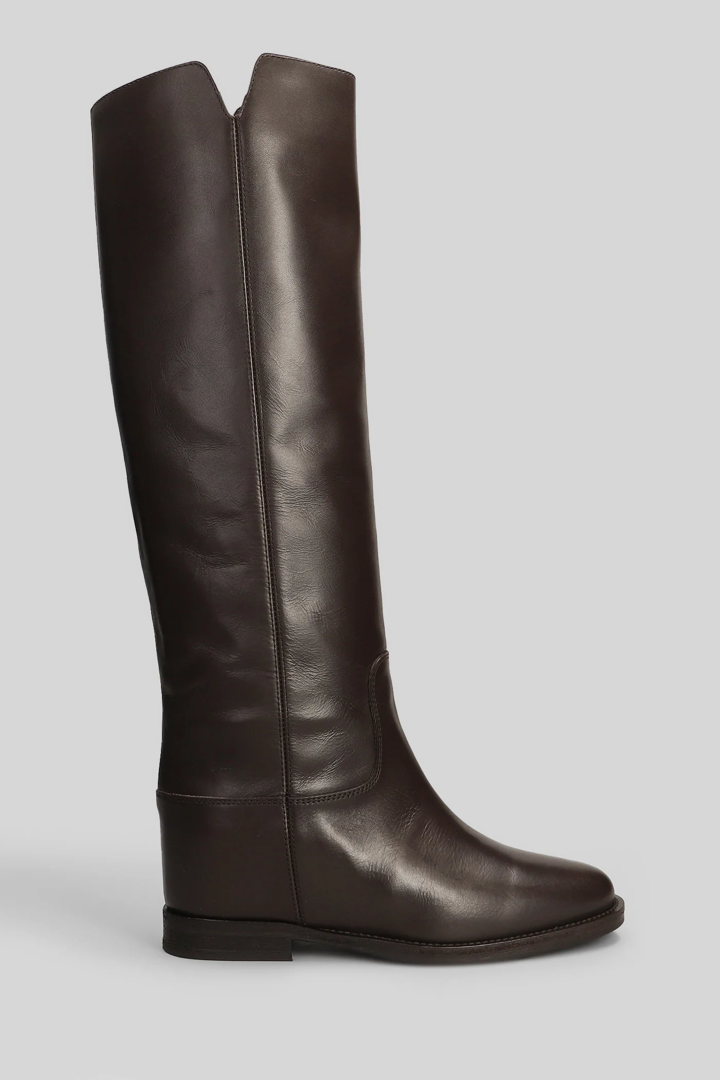 in dark brown leather