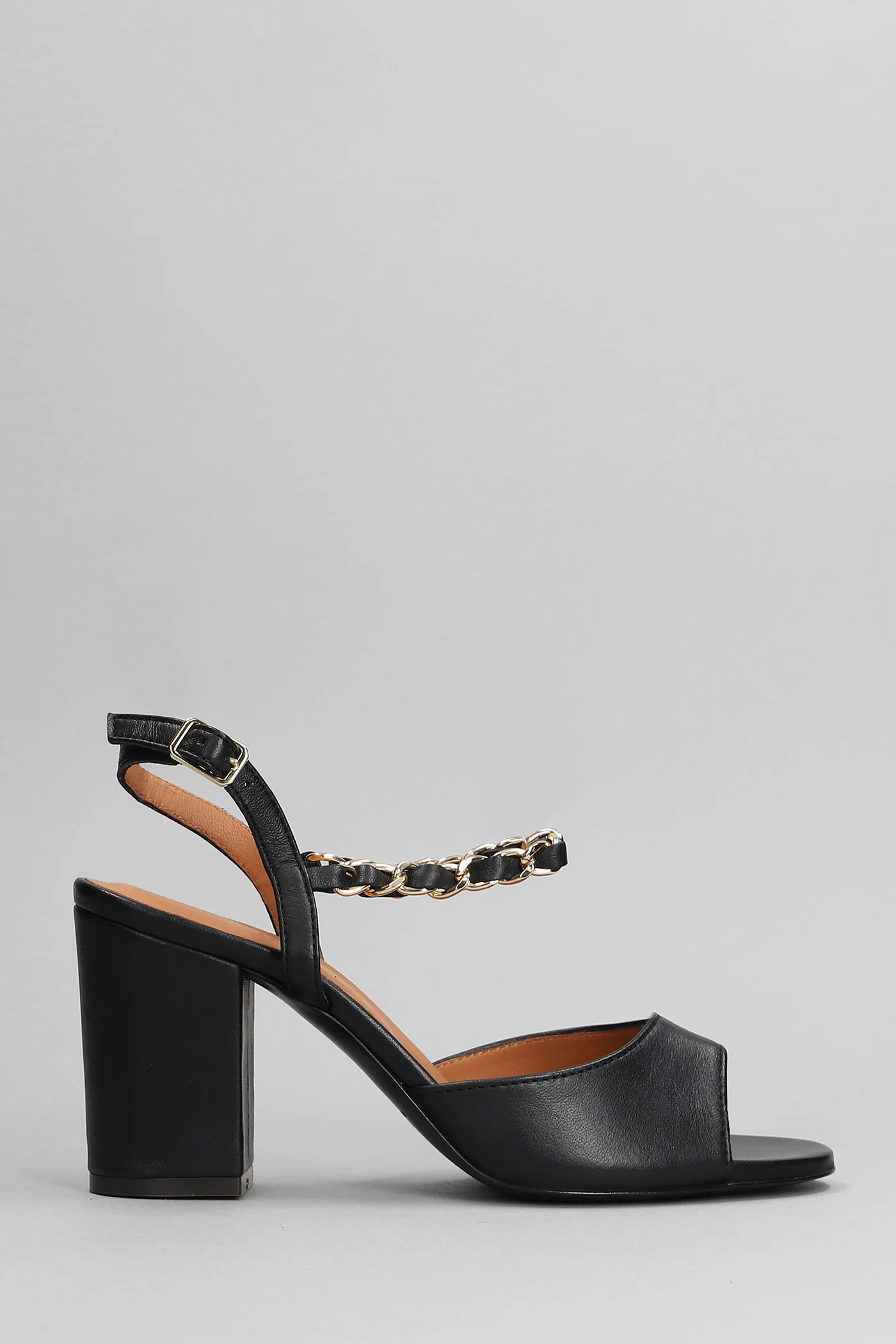 Sandals in black leather
