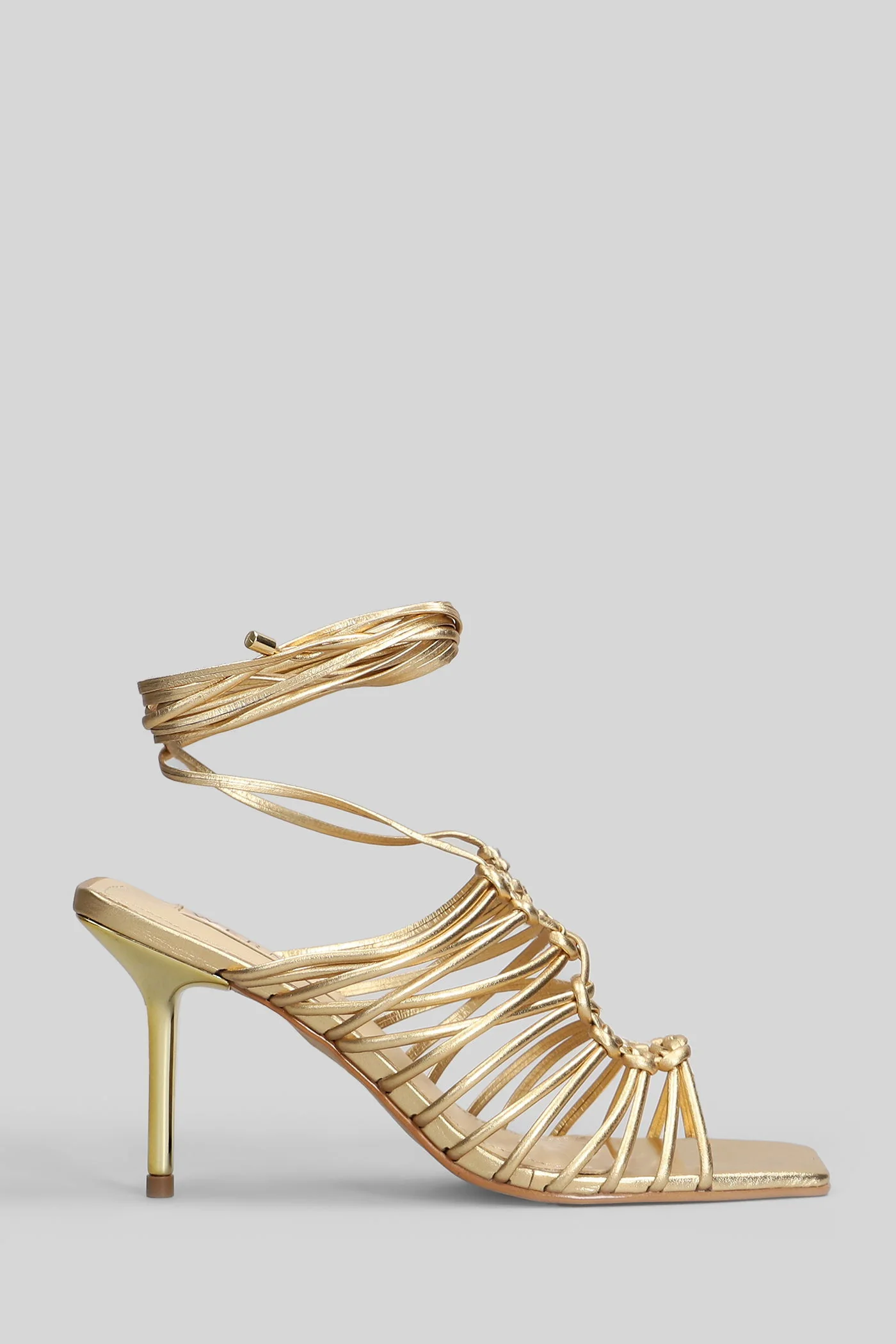Sandals in gold leather