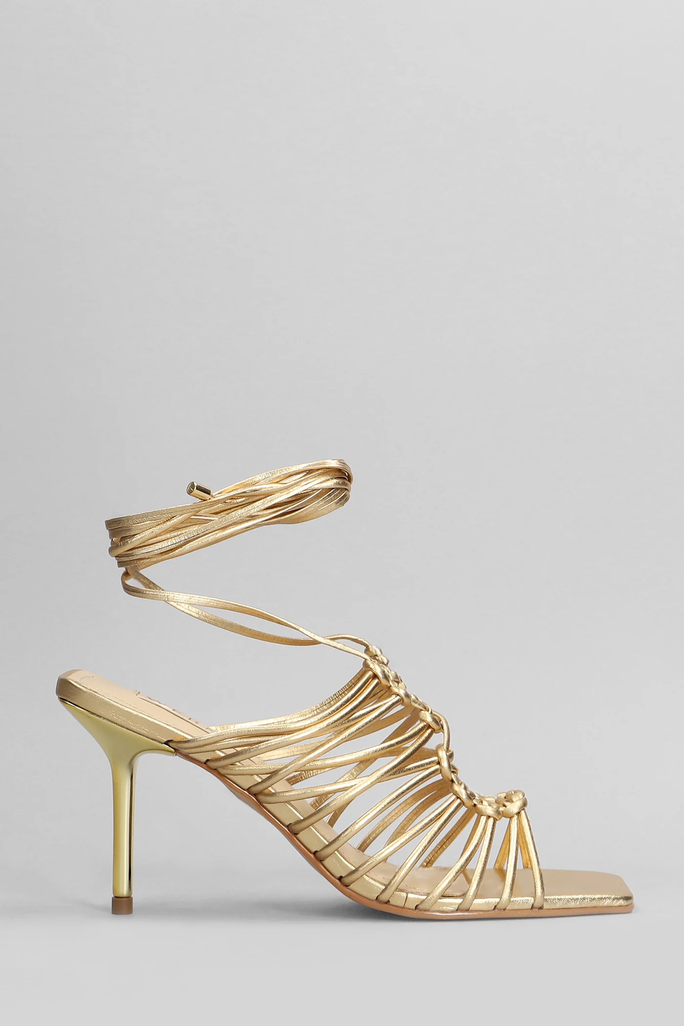 Sandals in gold leather