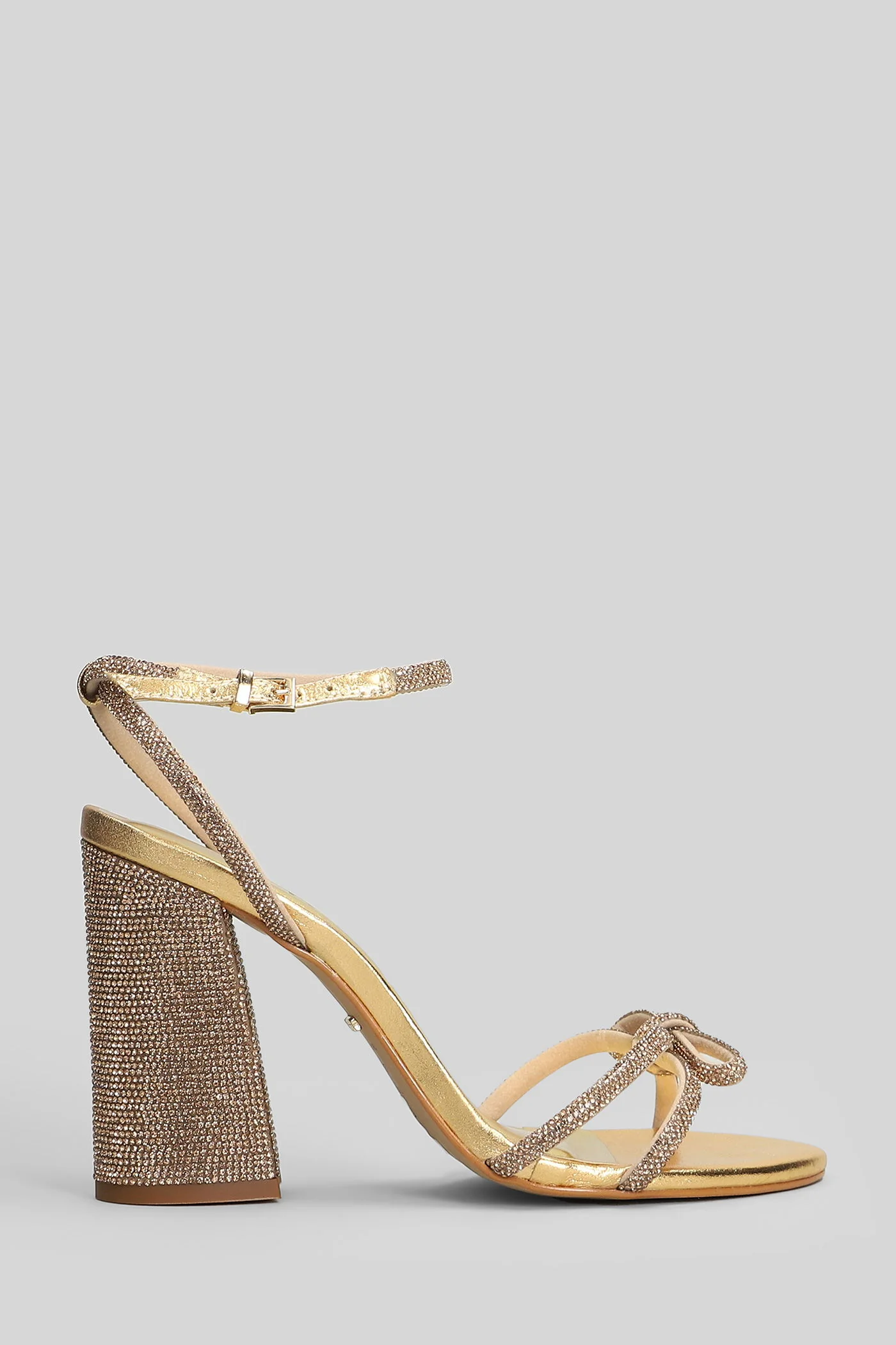 Sandals in gold leather
