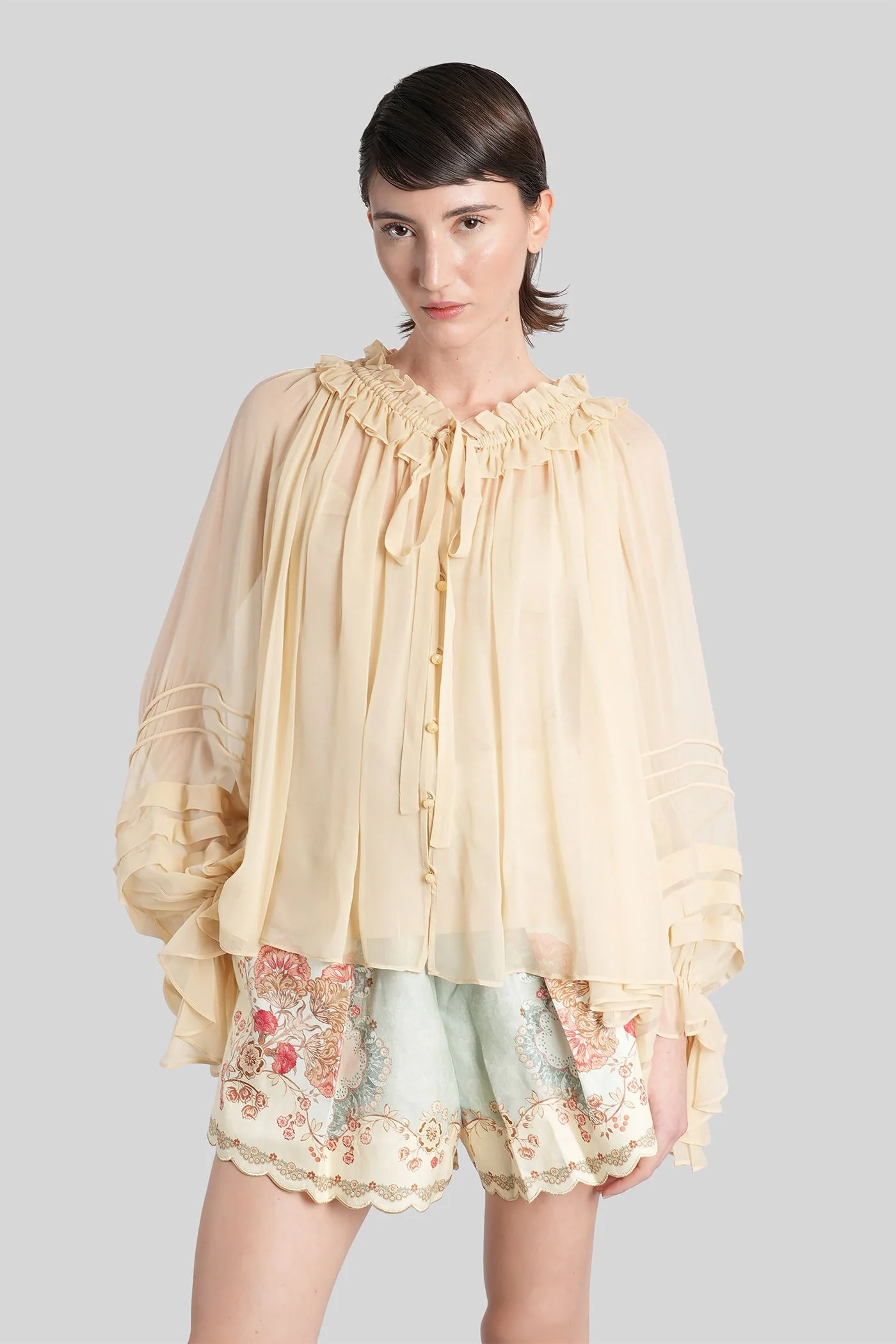 Blouse in beige silk