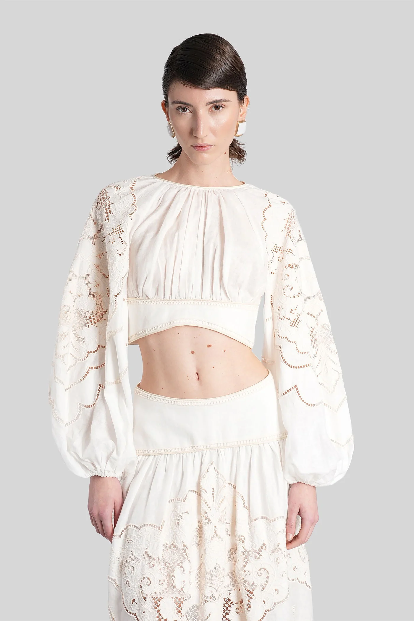 Topwear in white linen